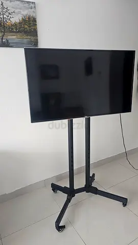 TCL 43” Full HD Smart LED TV (Model LED43S6200FS) with a stand