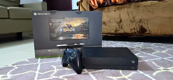 Microsoft Xbox One X with Controller and Box