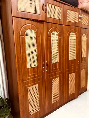 Sturdy Wooden Wardrobe with Elegant Rattan Design