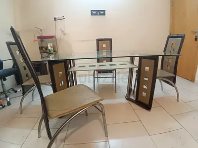 Stylish Glass Dining Table Set with Elegant Chairs