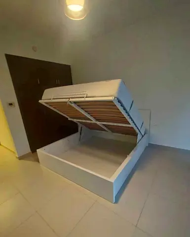 IKEA hydraulic queen‑size bed (160 × 200 cm) with  IKEA mattress