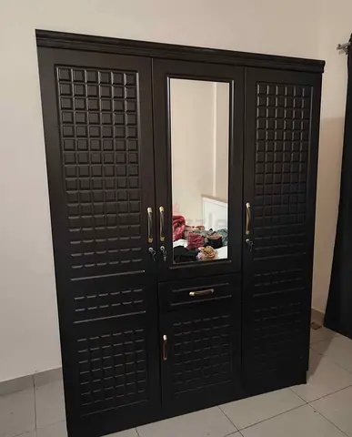 Elegant Three-Door Wardrobe with Mirror