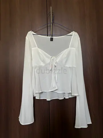 White long flared sleeve top