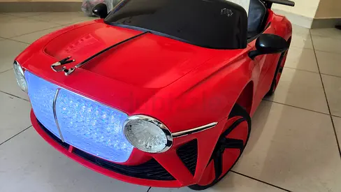Kids Ride-On Bentley Car – Red | Battery Powered | Excellent Condition