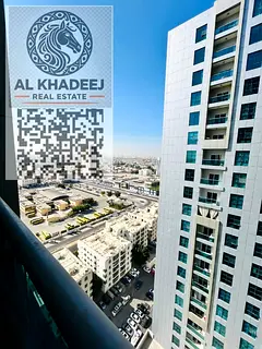 One bedroom and living room in City Towers with a partial view of Carrefour and Sharjah, close to al