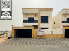 For sale a villa in Al Helio 2 in Ajman, 5 master bedrooms, a majlis, a hall, a maid's room, and