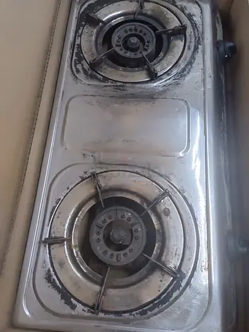 Used Double Burner Gas Stove in Need of a Clean (Cho Lha)