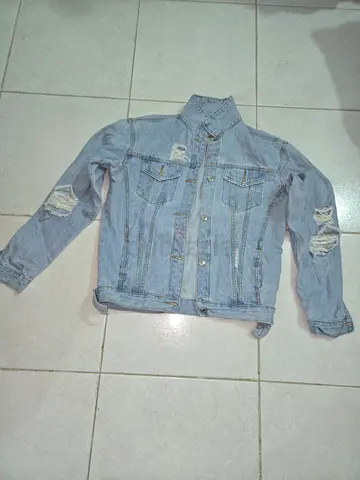 Stylish Light Blue Denim Jacket with Ripped Details