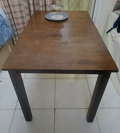Solid Wooden Dining Table - Perfect for Everyday Use.urgent sale.