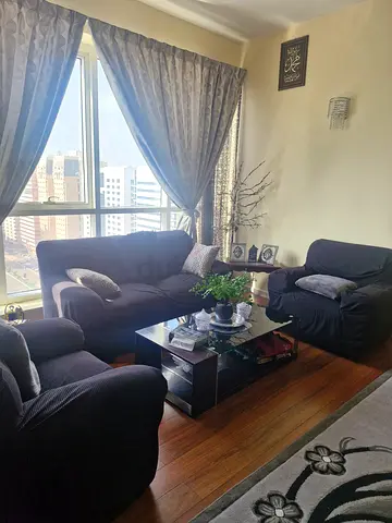 Leather sofa with sofa cover for sale