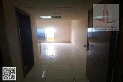 For annual rent in Ajman, a one-bedroom apartment with a balcony and central air conditioning in Al