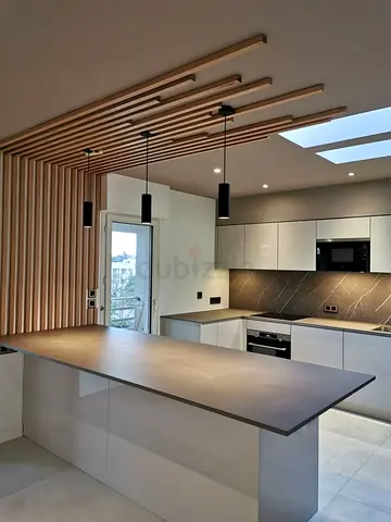 Modern Kitchen with Stylish Wood Accent Wall