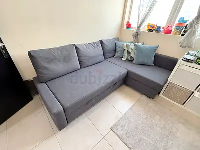 Comfortable L-Shaped Sofa with Bed Functionality and Storage box