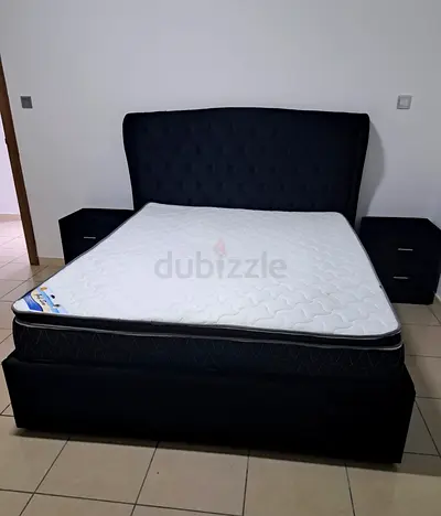 Elegant Black Bed with Nightstands for Sale