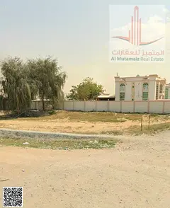 Land for sale in Ajman, Al Muwaihat 3, on Granada Main Street. Residential/Commercial. Ground + 2 fl