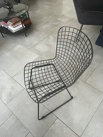 Black metallic mesh chair