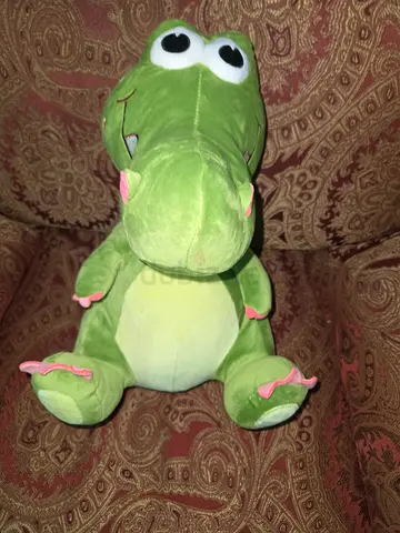 Adorable Green Stuffed Dinosaur