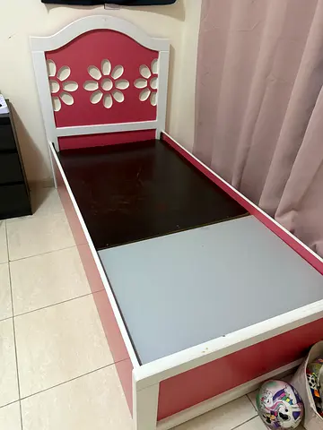 Charming Baby Bed with Floral Design
