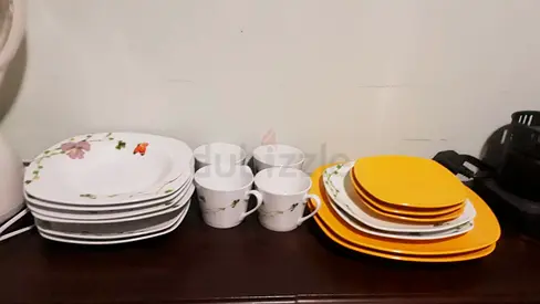 Elegant Dining Set with Beautiful Plates and Cups