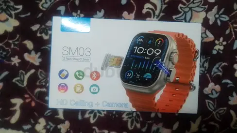 Pop up camera watch it contains sim card and HD calling 2.2 inch display.  With three straps