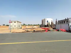 Independent residential plot with street and alley access, including registration and ownership fees