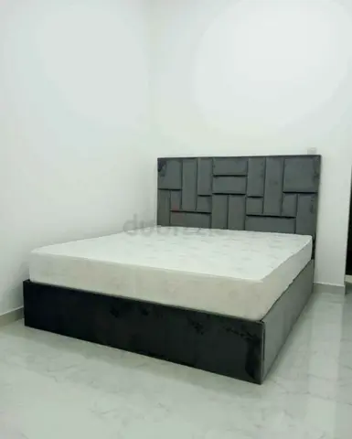 Stylish Queen Size Bed with Modern Headboard