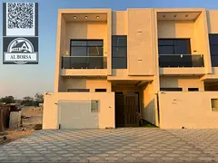 For rent a villa in Al Helio 2 in Ajman, 4 master bedrooms, a majlis, a hall, a maid's room, and