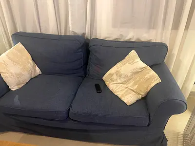 Cozy Blue Sofa with Cushions