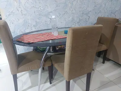 Elegant Oval Glass Dining Table