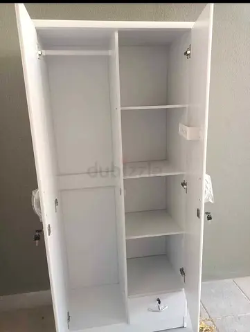 2 door cupboard for sale. Brand new. Delivery available.