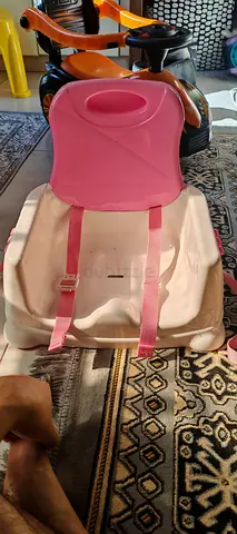 Pink Baby Bath Seat for Safe Bathing and feeding.