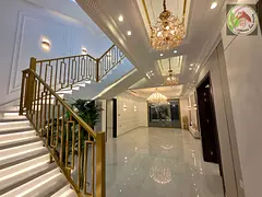 Own a luxurious villa in the best areas of Ajman, corner of two streets | Two floors &amp; roof | Re