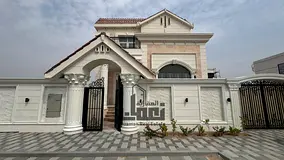Brand new two-storey villa for sale in Tilal City Zone C, Sharjah Emirate, featuring a stone facade