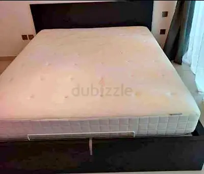Ikea king size hydraulic bed frame with IKEA mattress