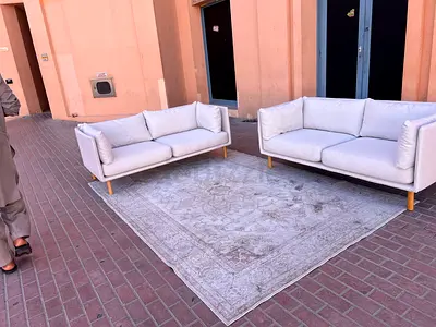 Elegant White Sofa Set with Rug