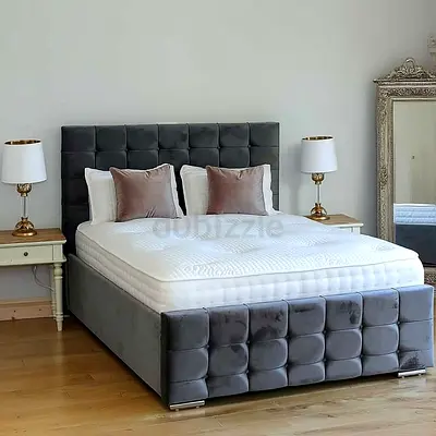 Elegant Grey Upholstered Bed with Stylish Headboard