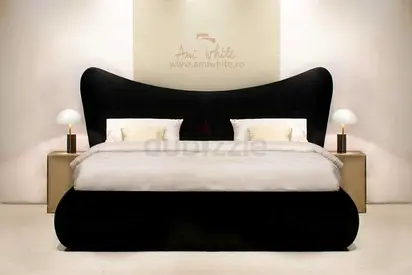 Elegant Black Curved Bed with Nightstands