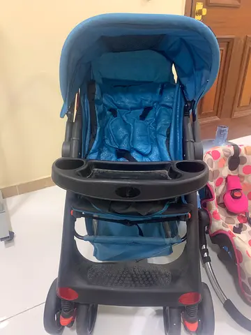 Comfortable Blue Stroller, pink car seat, indoor chair seat