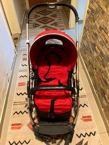 Stylish Red Stroller for Your Little One