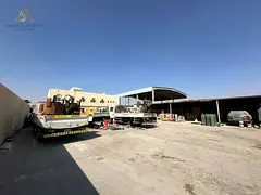 20000 sqft Open Yard / 107 KVA Power / Labour Camp / 2 Office / 19 Rooms/ For Sale / Al Sajaa Indust