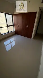 Three-bedroom apartment with a living room, built-in wardrobes, parking, and one month free.