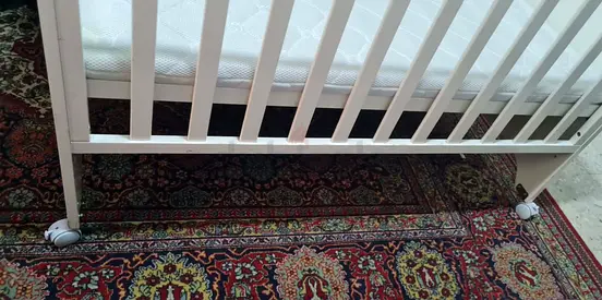 Used White Baby Crib with Wheels