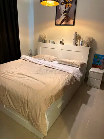 Stylish and Cozy Bed Frame with Soft Bedding