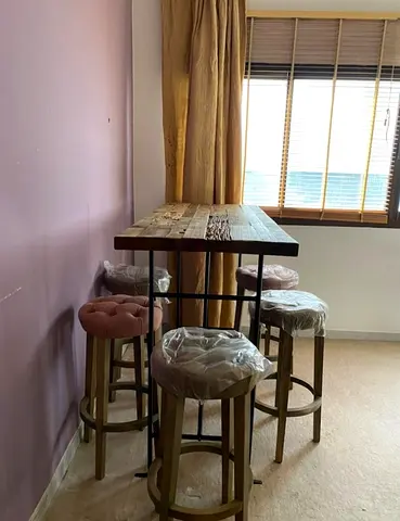 Stylish Bar Table with Stools