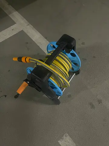 Garden hose and grass sprayer