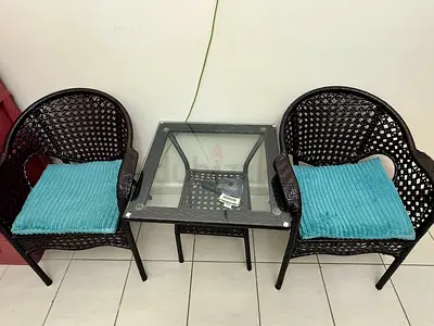 Charming Wicker Chair Set with Glass Table