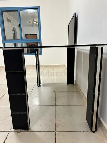 Stylish Glass Top Table with Black Legs