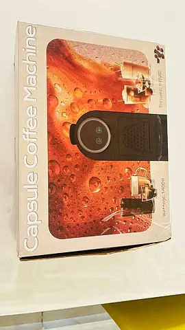 Compact Capsule Coffee Machine for a Quick Brew