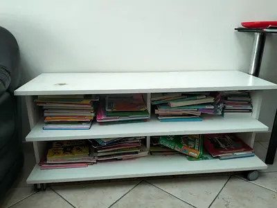 Good quality TV stand with shelves Strong and Durable Perfect Condition Only has one mark