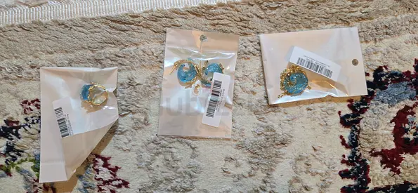 Beautiful Elegant Earrings in Light Blue Hue and necklace and ring